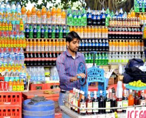 man standing inside store