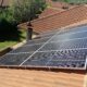 Solar panels on a red tile roof