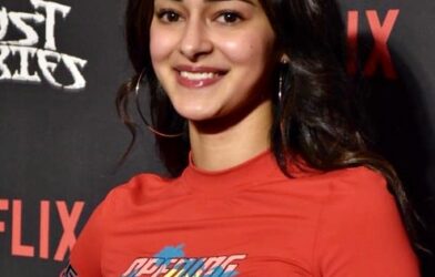 Ananya Panday wearing a deep purple Paithani saree with a tube blouse