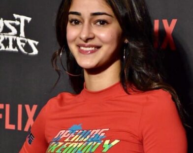Ananya Panday wearing a deep purple Paithani saree with a tube blouse