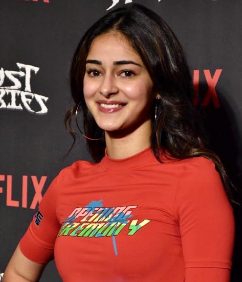 Ananya Panday wearing a deep purple Paithani saree with a tube blouse