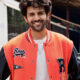 Actor Kartik Aaryan posing during a film production event