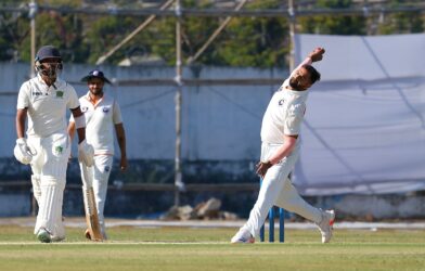 Auqib Nabi bowling for India during a cricket match
