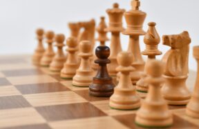 selective focus photography of chess pieces