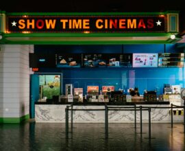 The cinema has a bright "show time" sign