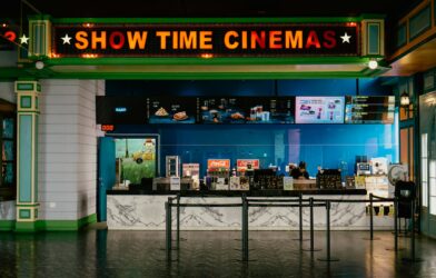 The cinema has a bright "show time" sign