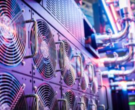 Close-up of server cooling fans in a vibrant data center