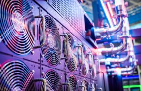 Close-up of server cooling fans in a vibrant data center