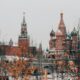 Saint Basil's Cathedral and Spasskaya Tower in Moscow during a snowy winter day
