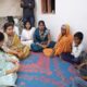 राज्यमंत्री मेघनाताई साकोरे-बोर्डीकर मयत शेतकरी कुटुंबीयांचे सांत्वन करताना