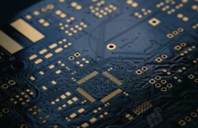 close up of dark blue circuit board