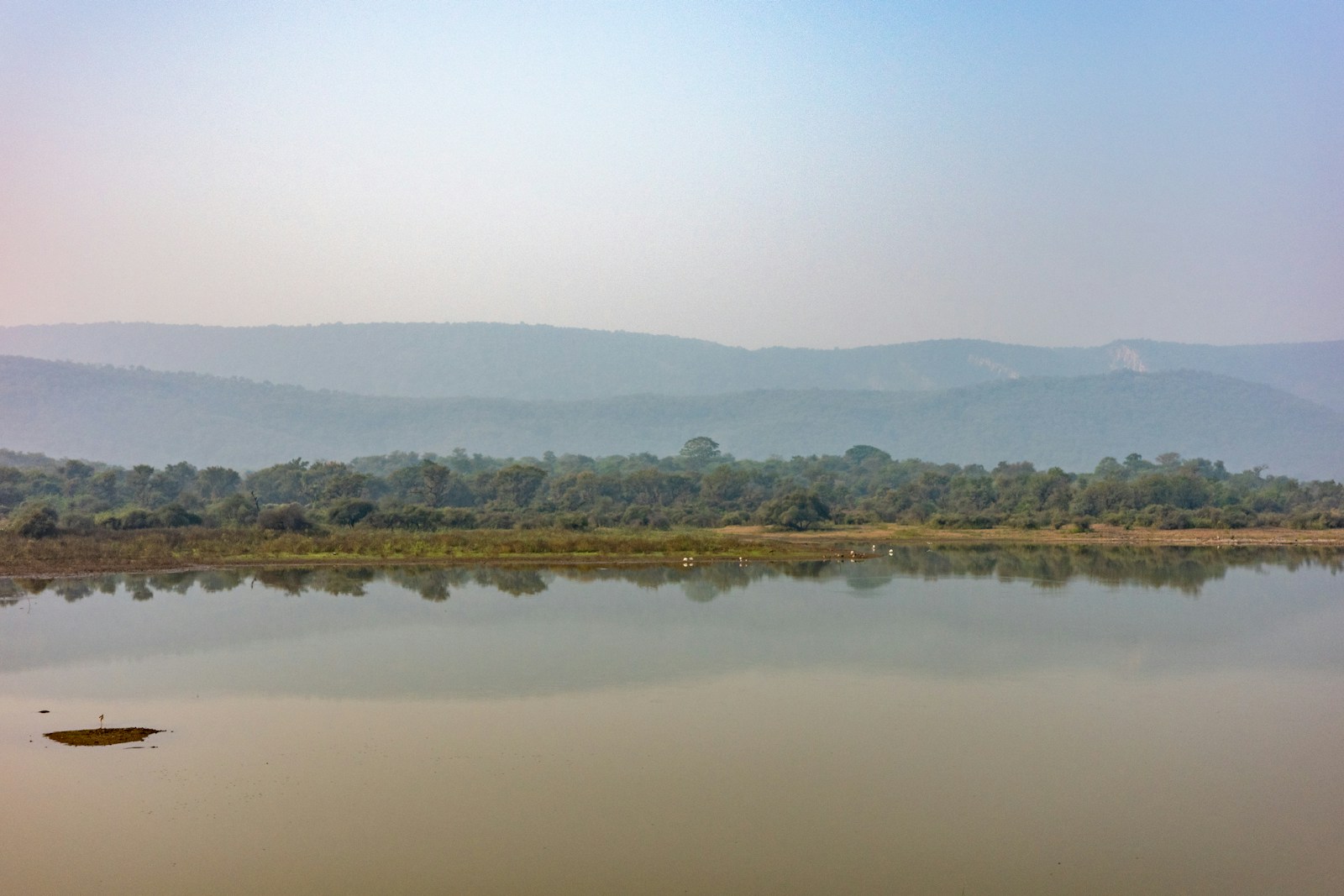 a large body of water surrounded by mountains