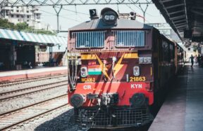 red train on a station platform