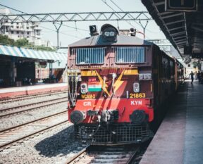 red train on a station platform