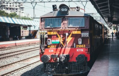 red train on a station platform