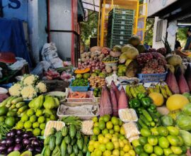 a market with fruits and vegetables