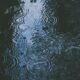 photo of body of water and droplets
